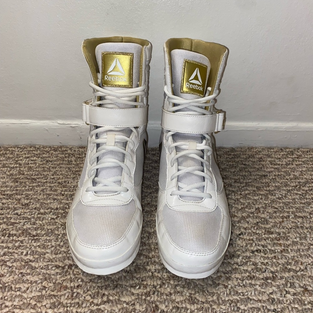 White and gold Reebok boxing shoes